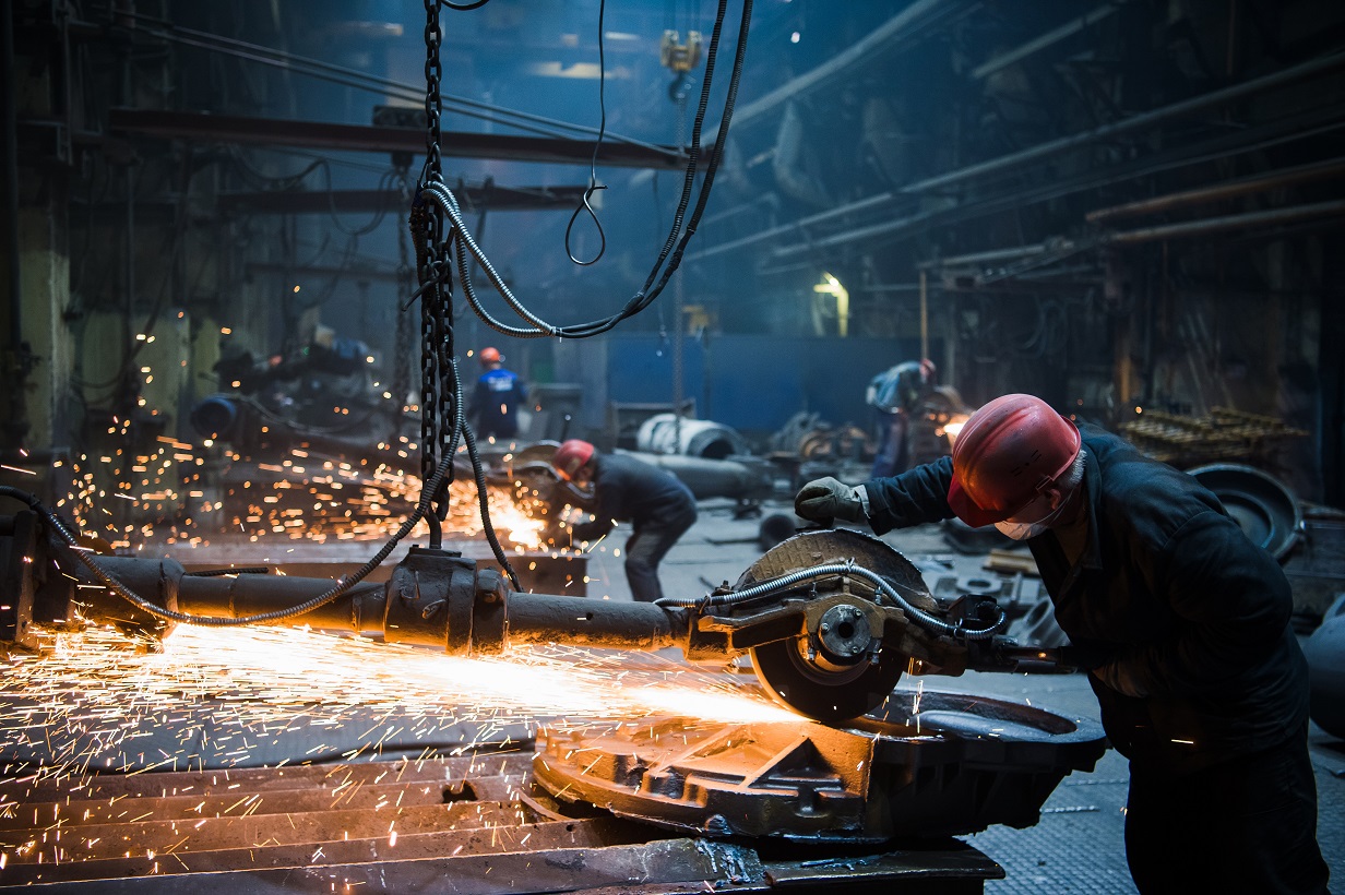 welder used grinding stone on steel