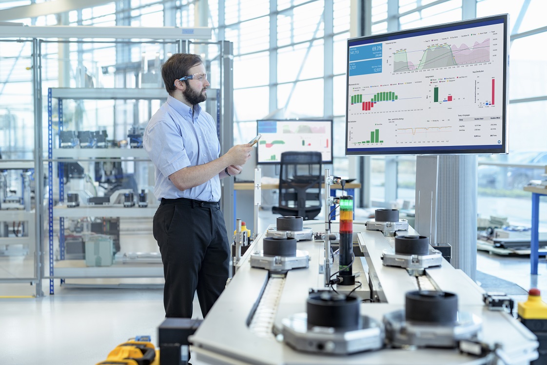 engineer testing a robotic production