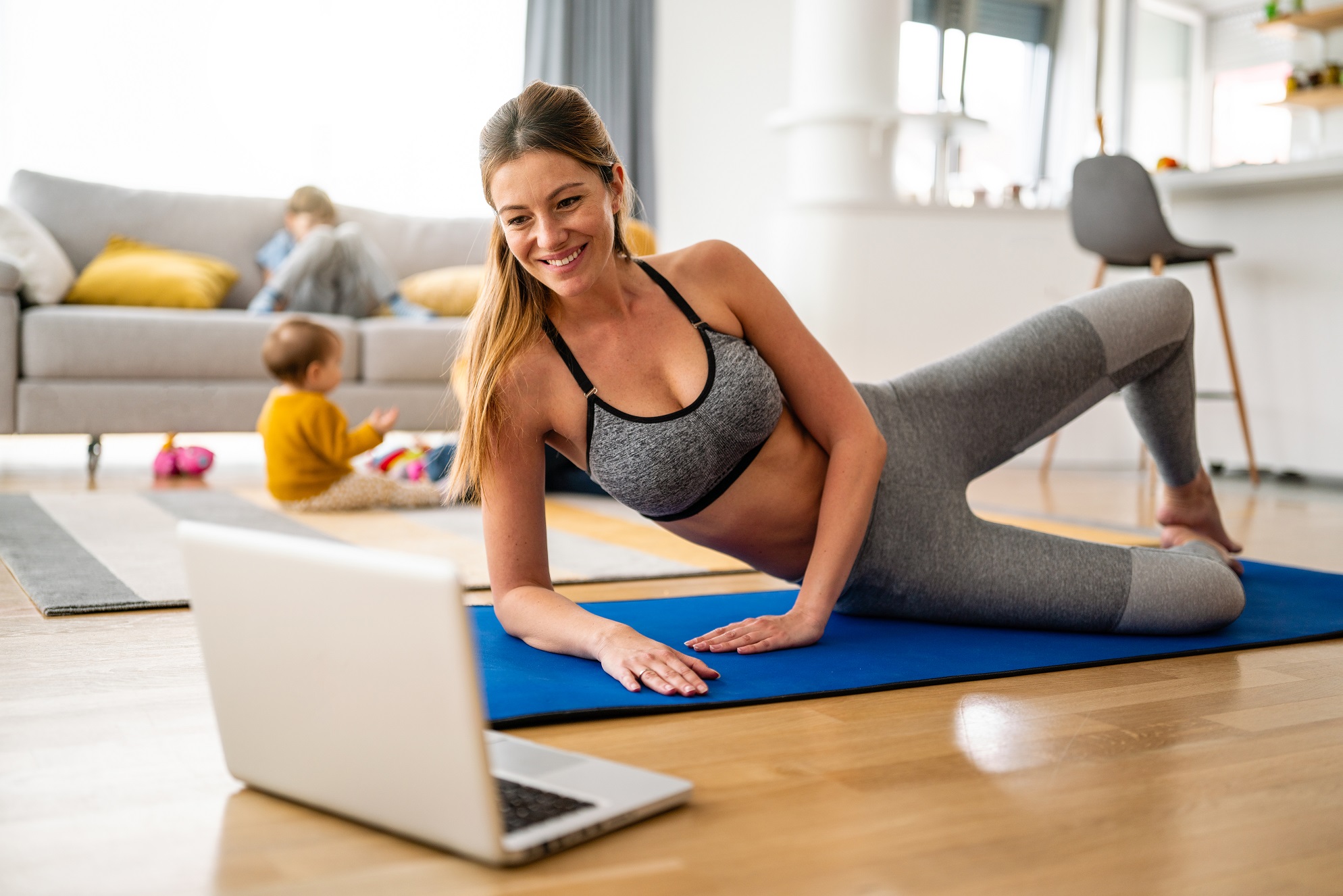 young woman is exercising yoga 