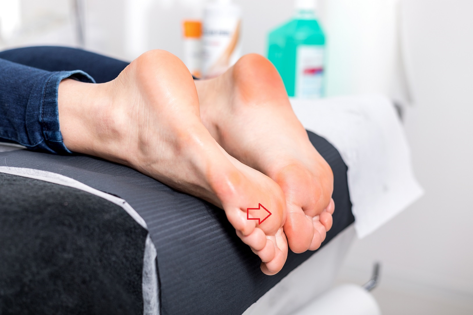 close up on female feet lying on bed