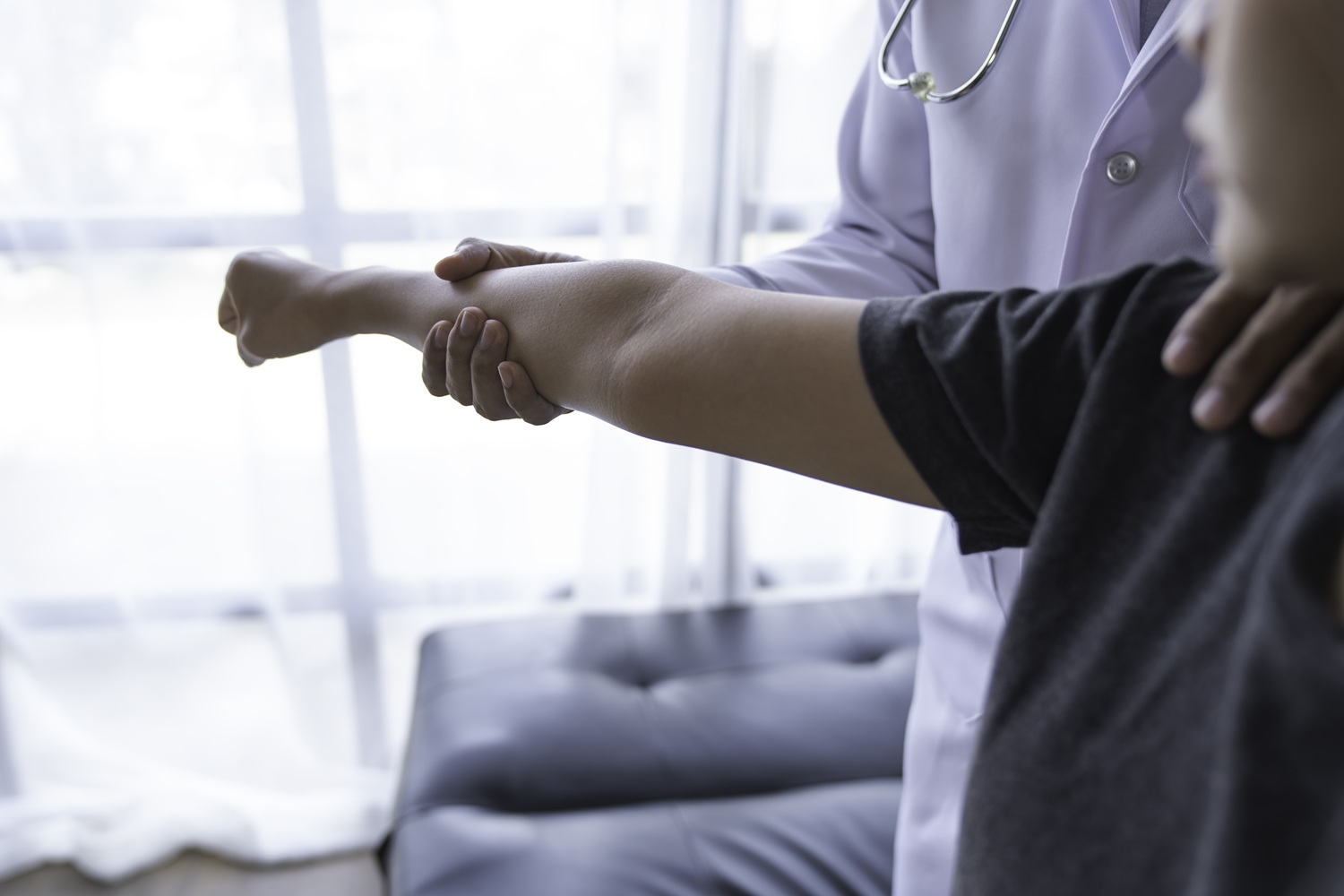 the doctor counsels the patient about pain in the