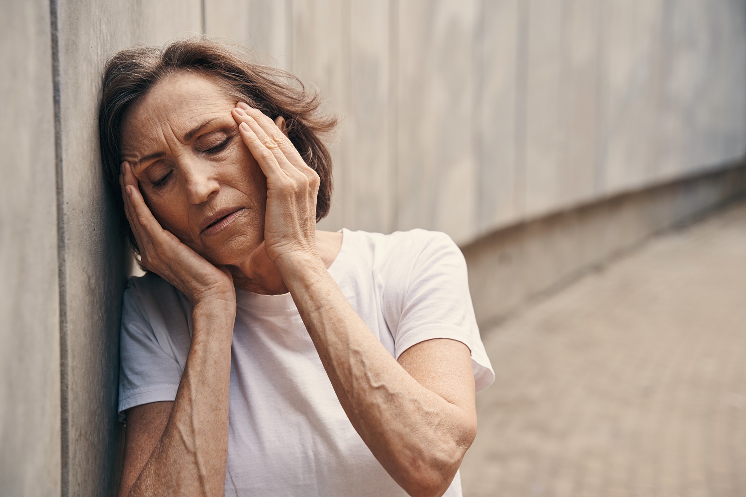 elderly active woman feeling pain